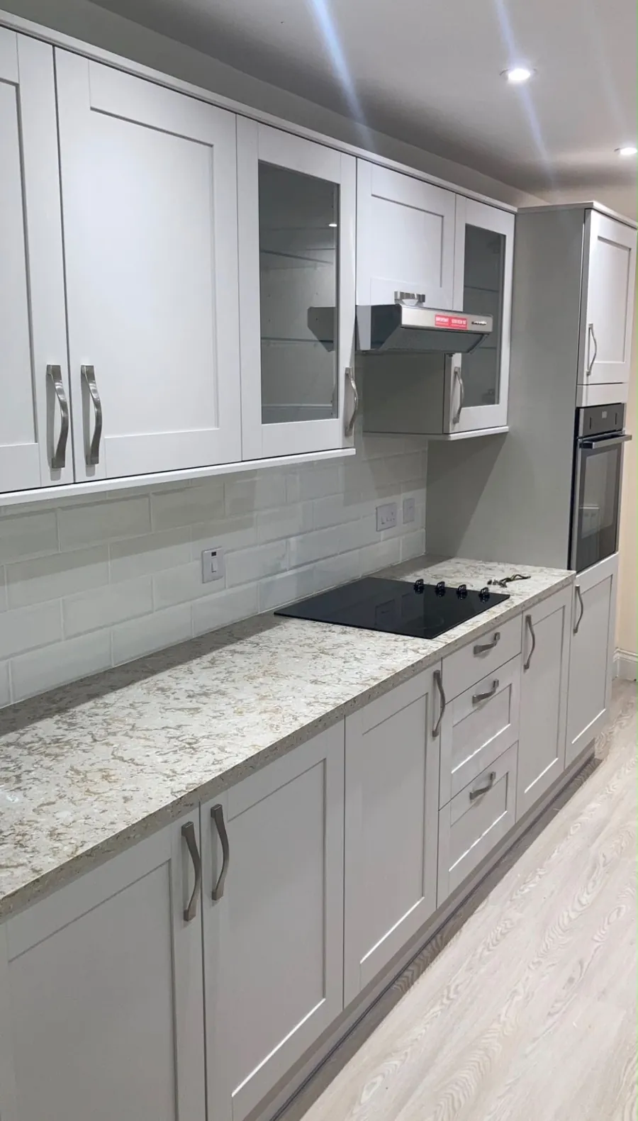 Grey Shaker kitchen, view 1